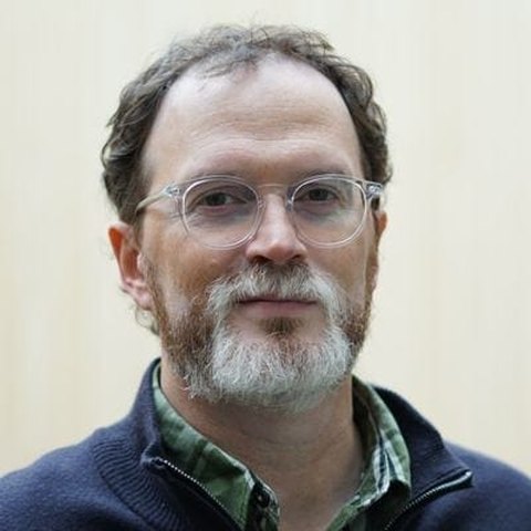 Portrait of Greg Less